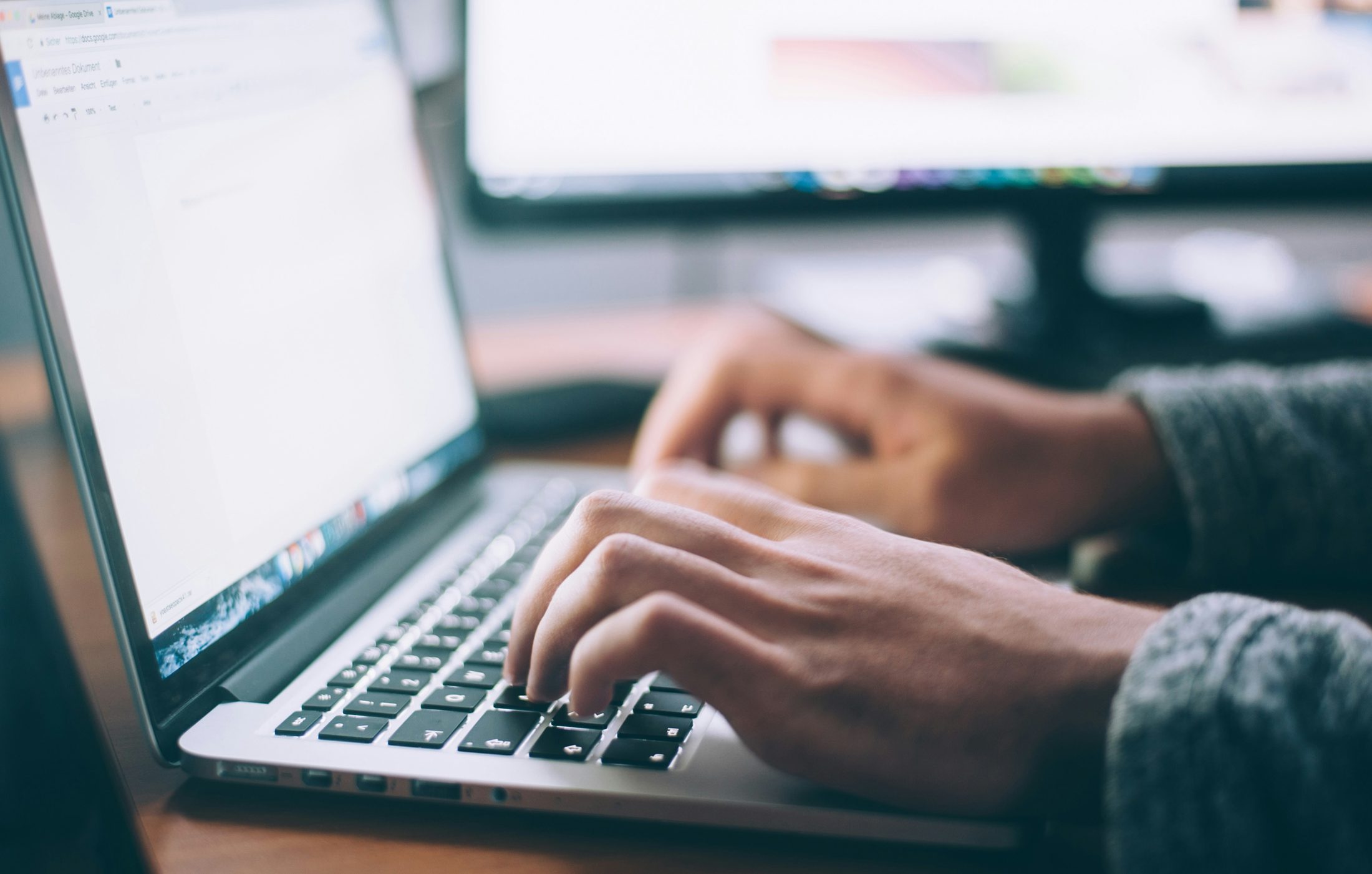 Typing an application on a laptop